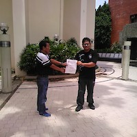 Glenn receiving promotion to Likha from SGM Caburnay.