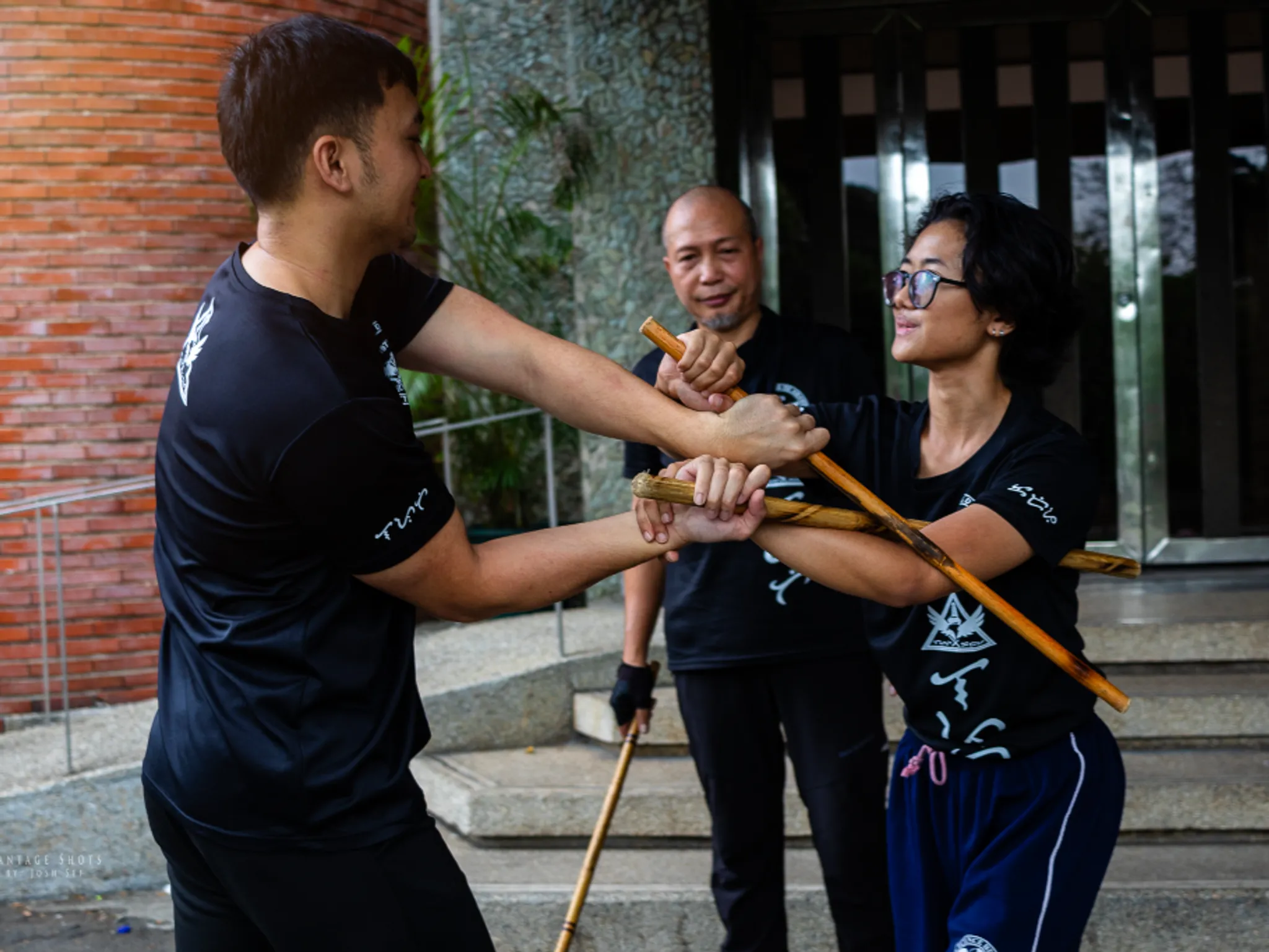 Ace Yorobe performing a stick lock on Josf Yorobe.