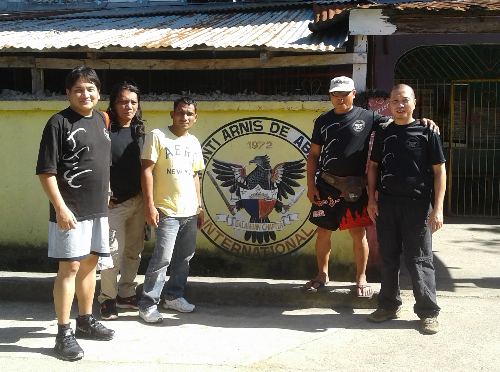 At the gate leading to Master Edgar's school and gym in Balamban.