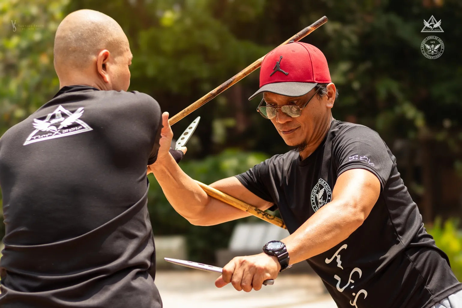 Lapunti Karilyon instructors espada y daga demonstration at UP Diliman
